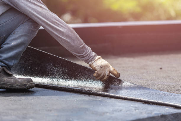 Professional Emergency Waterproofing technician working in Sparta, MI